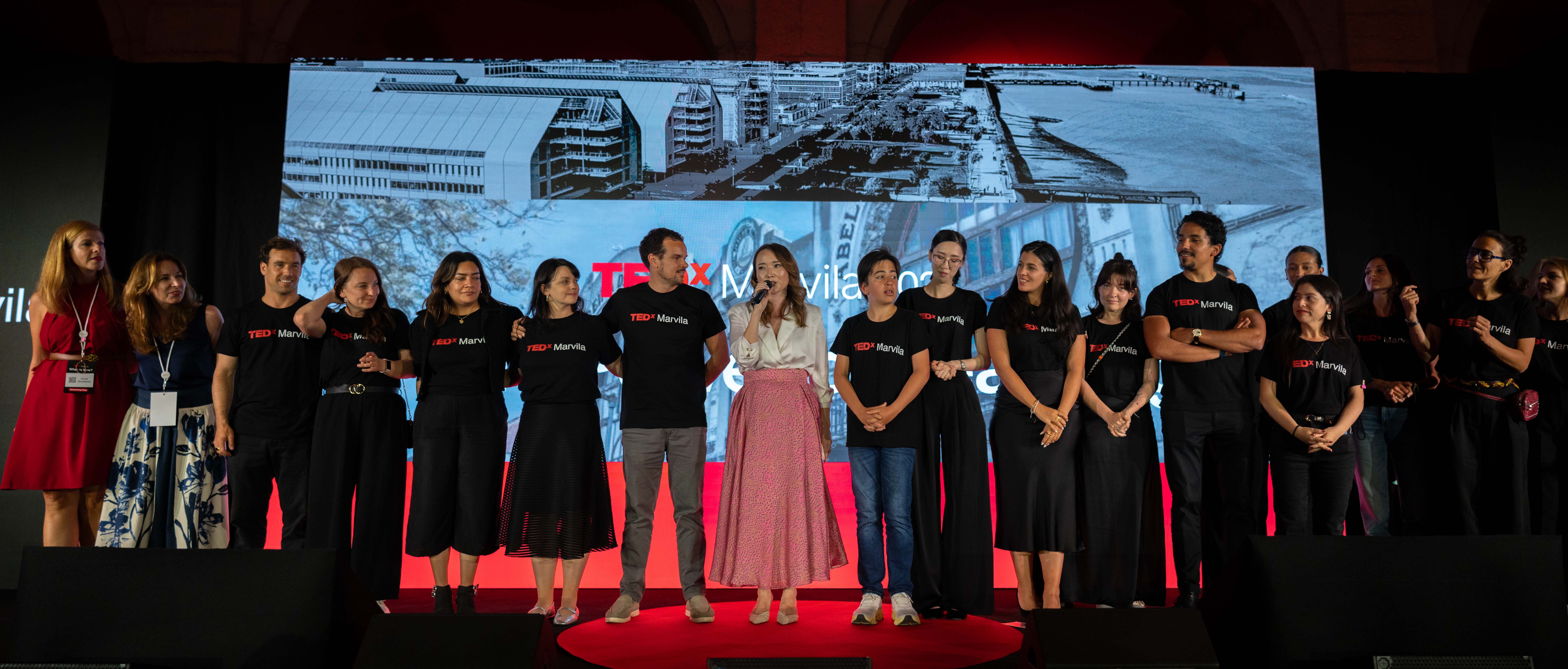 The TEDx Marvila team and speaker on stage